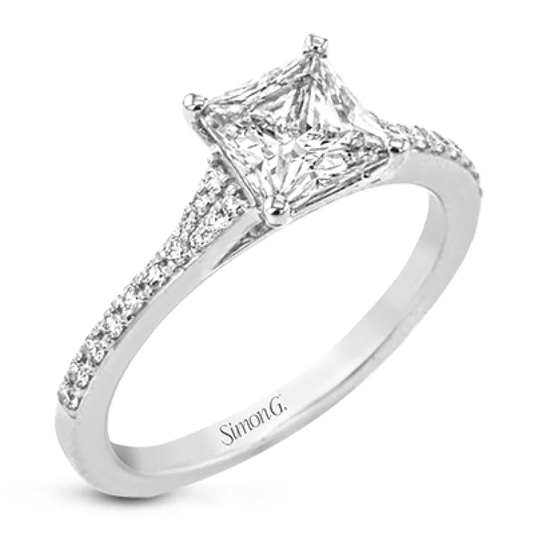 Women’s cushion cut diamond engagement rings-Simple yet stunning, this graceful engagement ring is made for a princess cut center stone and is set with .16 ctw of white diamonds.