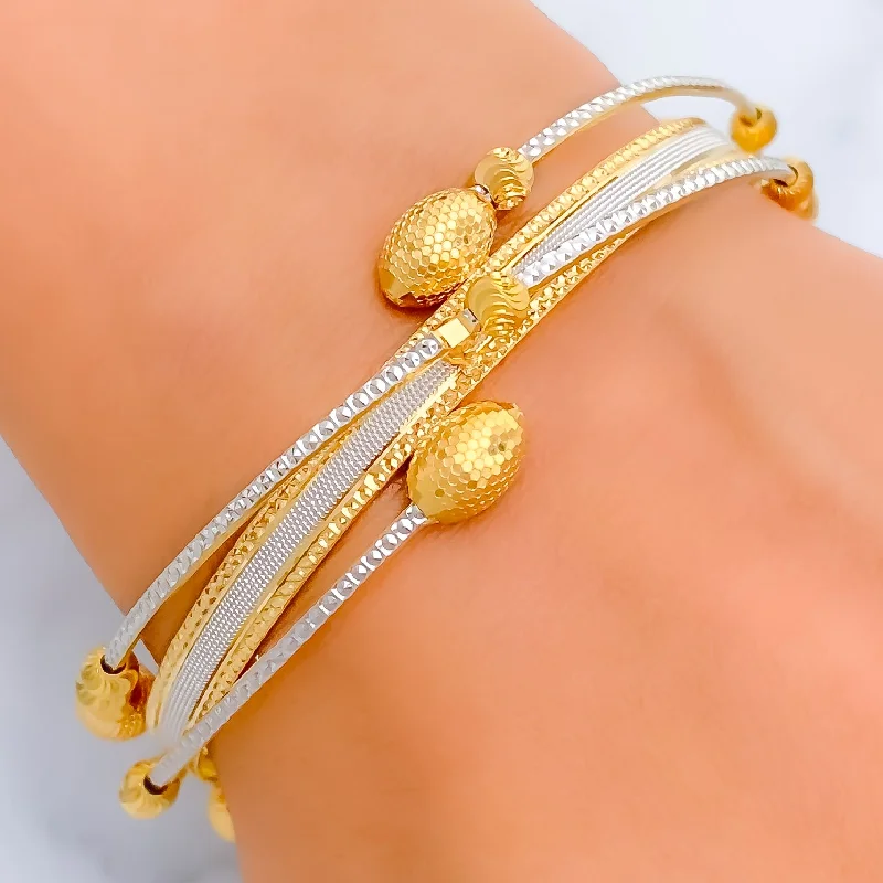 Women’s adjustable charm bracelets-Trendy Dynamic 22k Gold Alluring Bangle