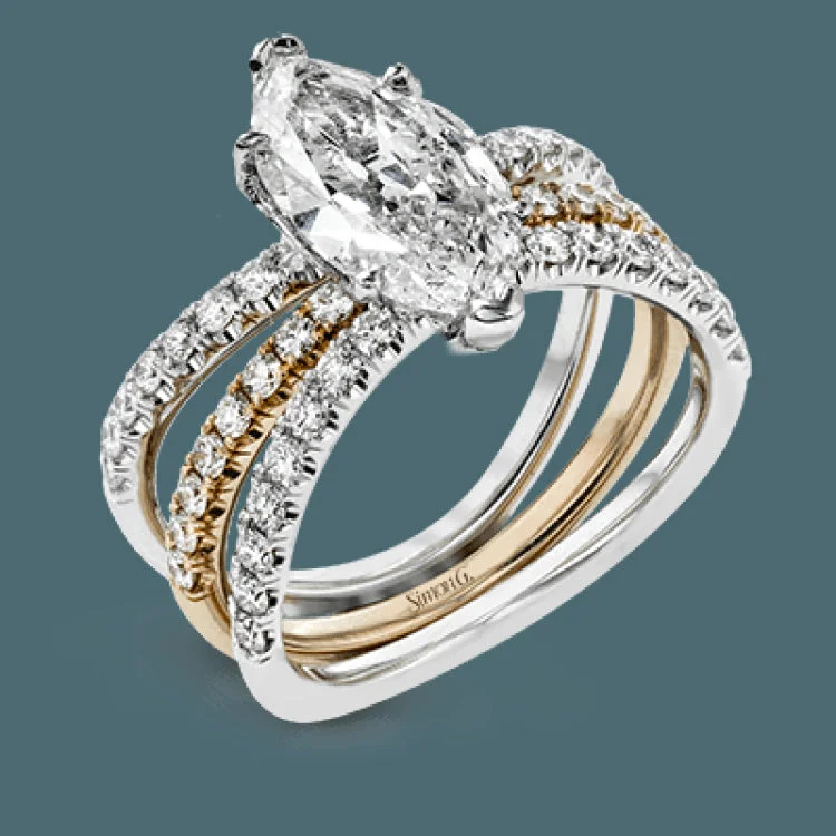 Women’s simple engagement rings-This distinctive bridal set design features a double-layer wedding band that fits around the engagement ring. The set contains .77 ctw of white diamonds.