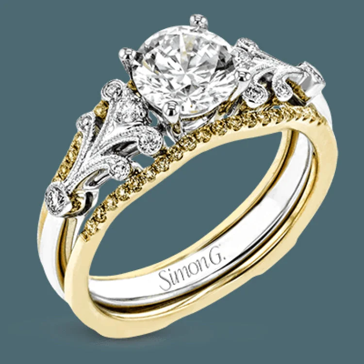 Women’s engagement rings with diamonds-This two-tone gold wedding set features a white gold engagement ring that nestles perfectly into the yellow gold guard that is set with .20 ctw of yellow diamonds.