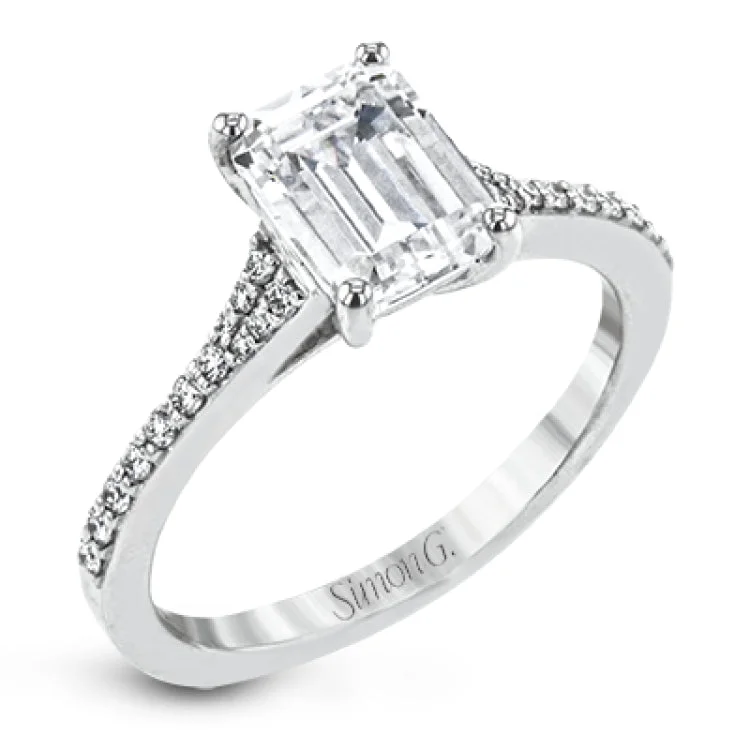 Women’s solitaire engagement rings-Simple yet stunning, this graceful engagement ring is made for an emerald cut center stone and is set with .16 ctw of white diamonds.