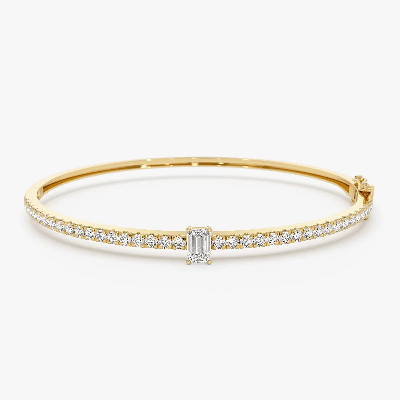 Women’s braided bracelets-14k Gold Emerald Cut and Round Diamond Bangle