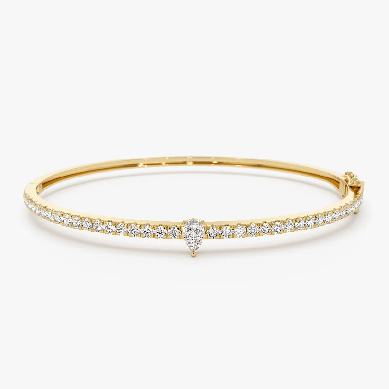 Women’s delicate bracelets-14k Gold Pear Shaped and Round Diamond Bangle