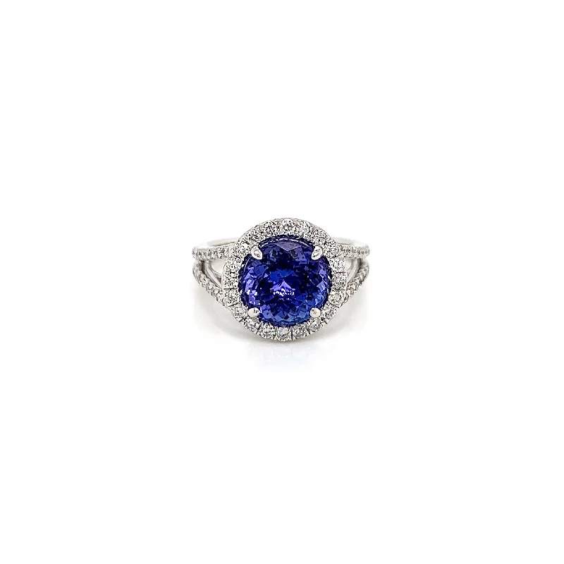 Women’s alternative engagement rings-4.15 Total Carat Tanzanite and Diamond Halo Engagement Ring