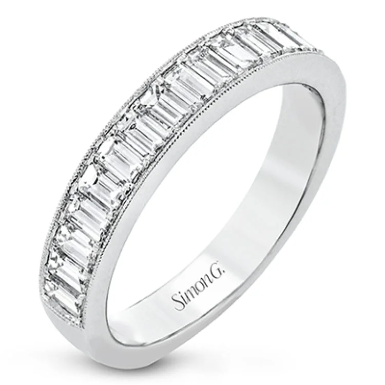 Women’s stackable engagement rings-This gorgeous anniversary band is the perfect selection for those who seek a luxurious style to accompany any engagement ring, it features 1.06 cttw baguette diamonds with milgrain edges