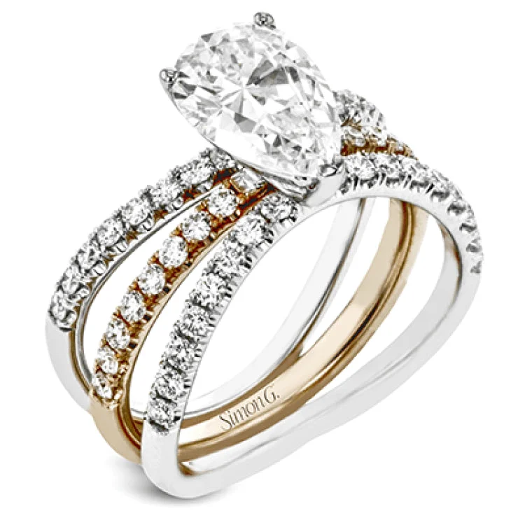 Women’s vintage-inspired engagement rings-This distinctive bridal set design features a double-layer wedding band that fits around the engagement ring. The set contains .77 ctw of white diamonds.