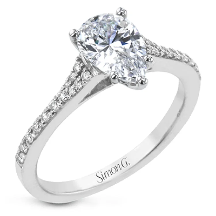 Women’s diamond engagement rings-Simple yet stunning, this graceful engagement ring is made for a pear cut center stone and is set with .16 ctw of white diamonds.