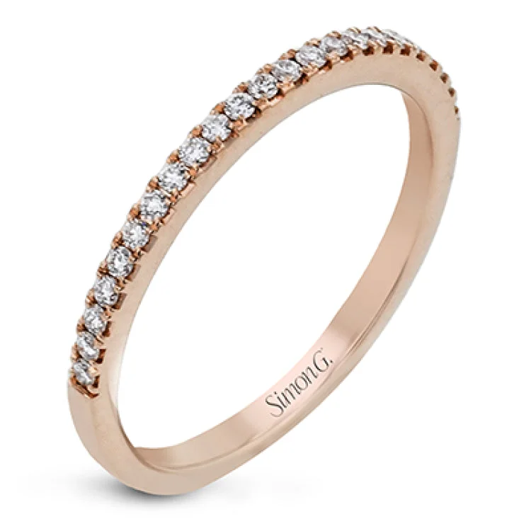 Women’s rose gold sapphire engagement rings-Simple yet stunning, this graceful engagement ring is made for an oval cut center stone and is set with .16 ctw of white diamonds.