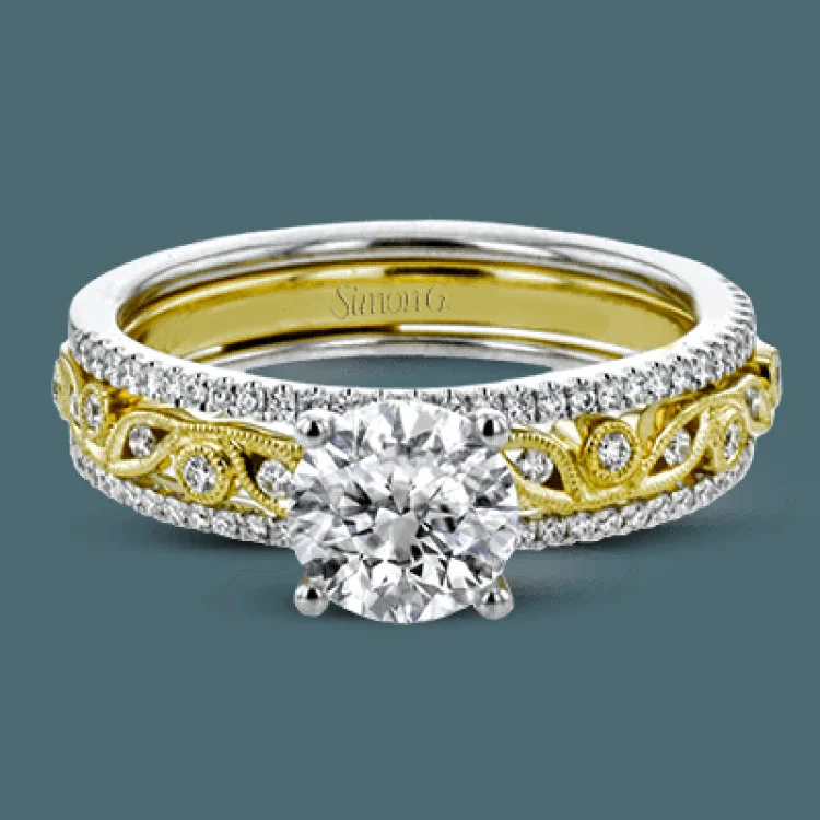 Women’s custom engagement rings-This beautiful two-tone 18k gold wedding set features an organic design white gold inner ring, with a yellow gold jacket surrounding it that is set with .22 ctw of yellow diamonds.