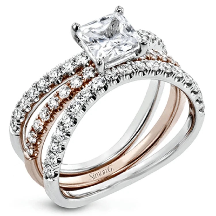 Women’s band engagement rings-This distinctive bridal set design features a double-layer wedding band that fits around the engagement ring. The set contains .77 ctw of white diamonds.