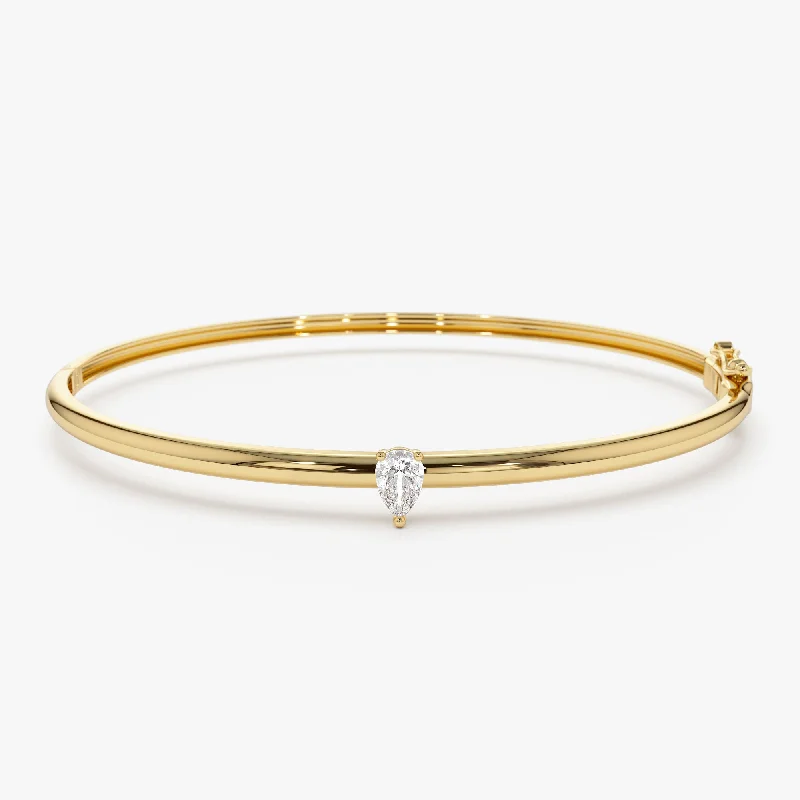 Women’s engraved bracelets-14K Pear Shape Diamond Solitare Bangle