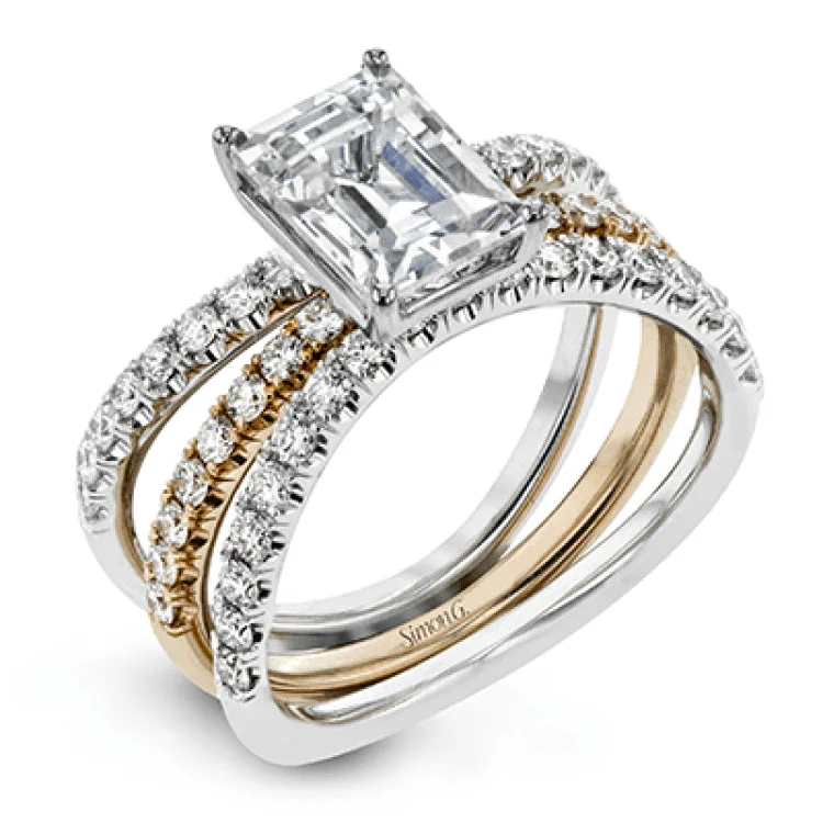 Women’s multi-stone engagement rings-This distinctive bridal set design features a double-layer wedding band that fits around the engagement ring. The set contains .77 ctw of white diamonds.