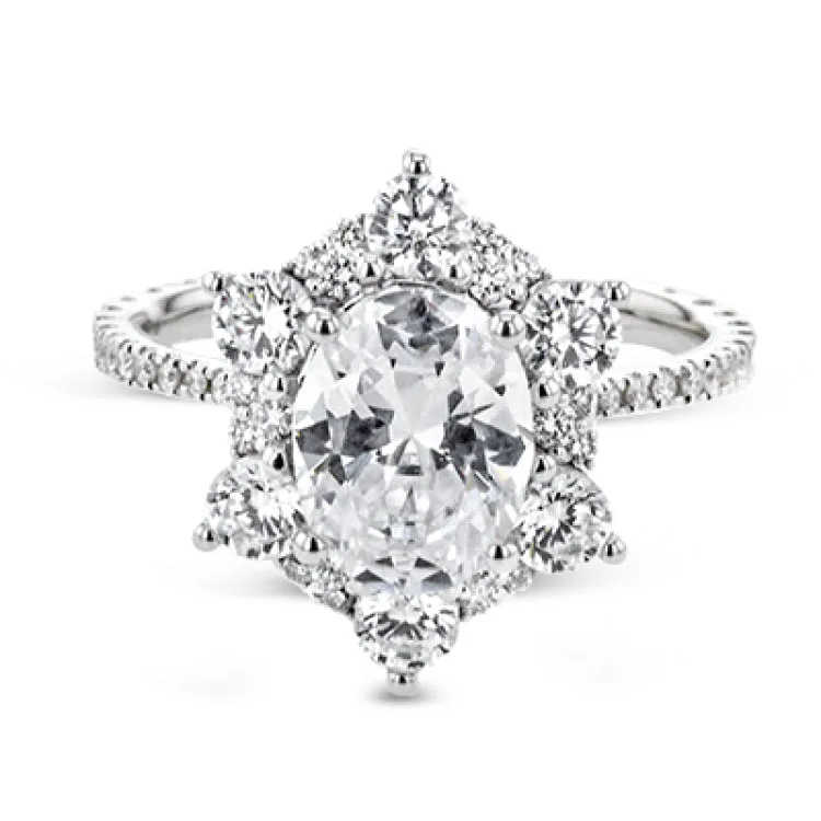 Women’s classic diamond engagement rings-Like a crystallized explosion of light, this remarkable engagement ring design features a supernova of .60 ctw of diamonds surrounding the oval shaped center stone, as well as .38 ctw of smaller diamonds down the band.