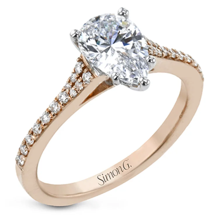 Women’s classic engagement rings-Simple yet stunning, this graceful engagement ring is made for a pear cut center stone and is set with .16 ctw of white diamonds.