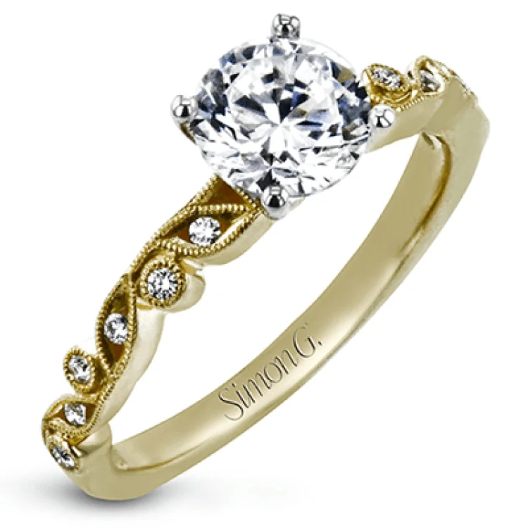 Women’s luxury engagement rings-This beautiful two-tone 18k gold wedding set features an organic design white gold inner ring, with a yellow gold jacket surrounding it that is set with .22 ctw of yellow diamonds.